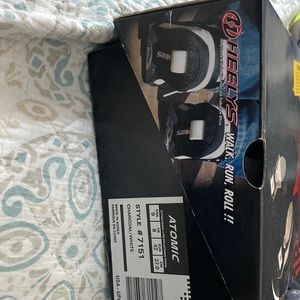 Gray Heelys sneakers never worn, still in box.